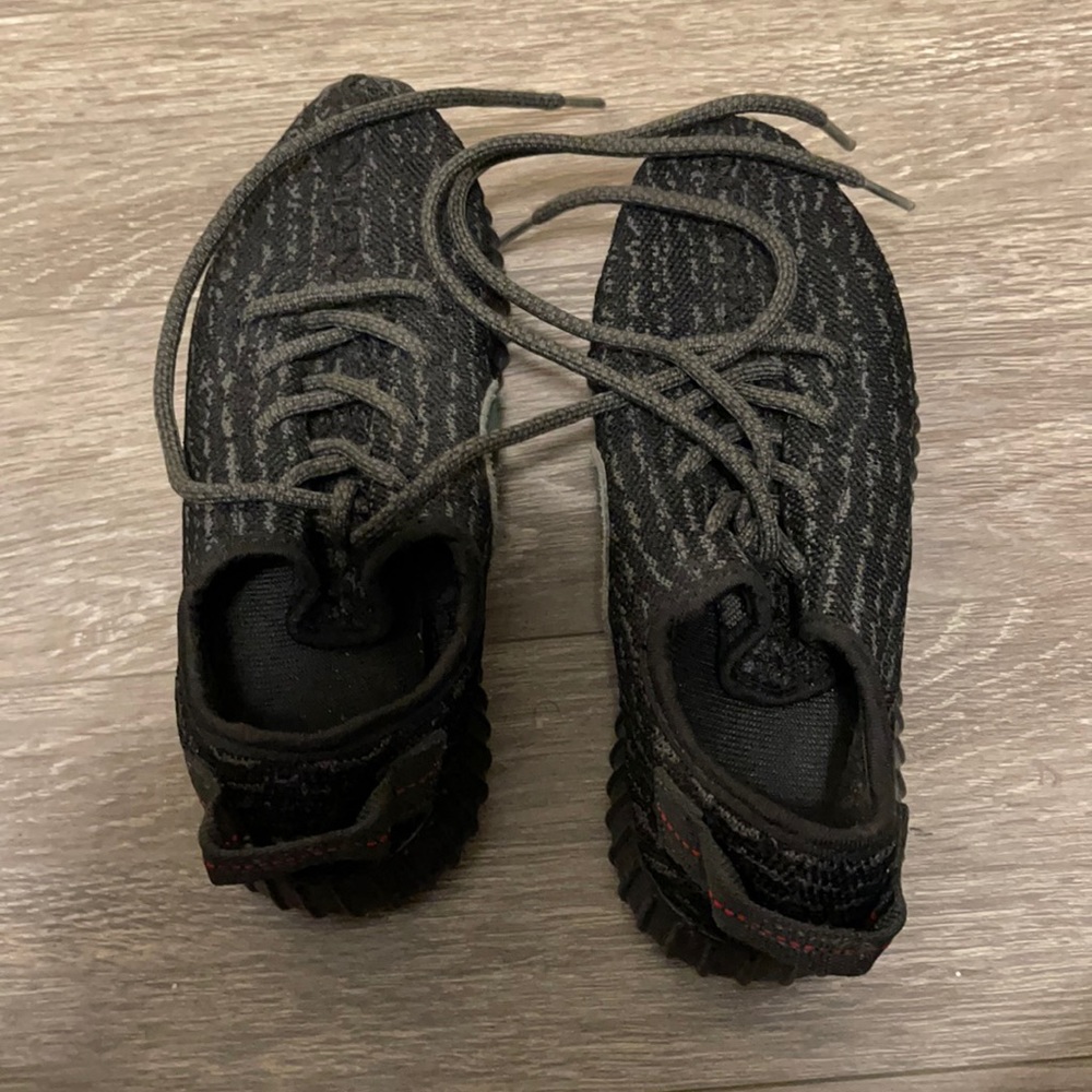 Gently worn original black Yeezy sneakers